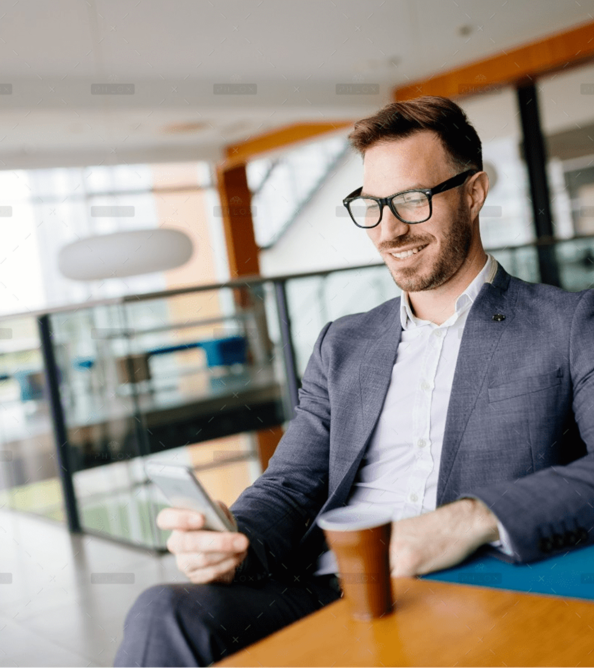 demo-attachment-2831-businessman-taking-a-break-with-a-cup-of-coffee-JW4B3DH